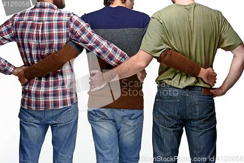 Image of United friends of business men standing in embrace in background