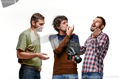 Image of Friends with camera on white