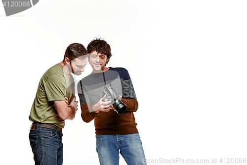 Image of Friends with camera on white