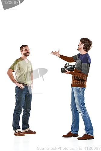 Image of Friends with camera on white