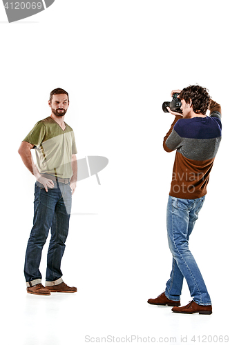 Image of Friends with camera on white