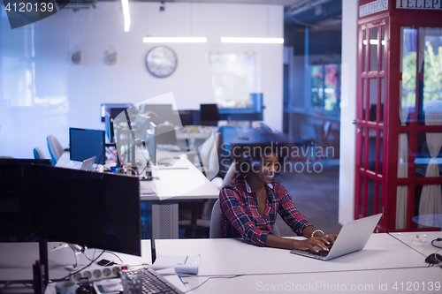 Image of portrait of a young successful African-American woman in modern 