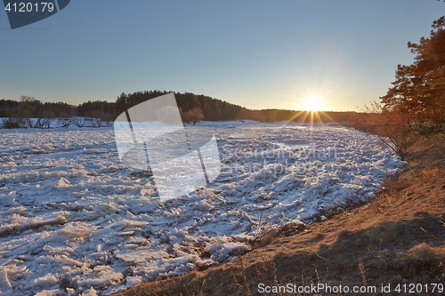 Image of Frozen River Sunset