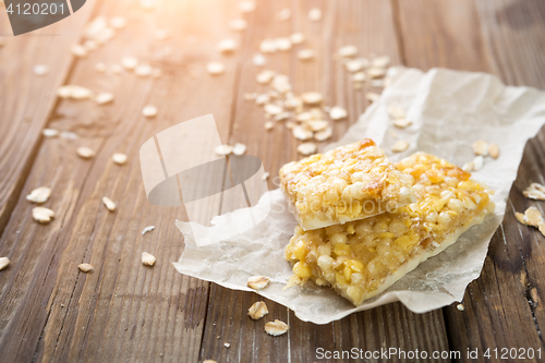 Image of Granola cereal on wooden table