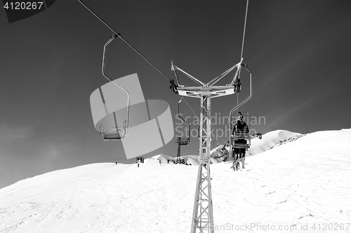 Image of Black and white view on old chair-lift and off-piste slope at sk