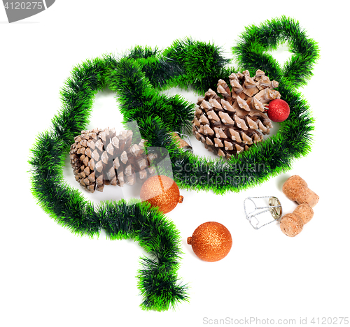 Image of Green Christmas tinsel, Christmas-tree balls, pine cones and cha