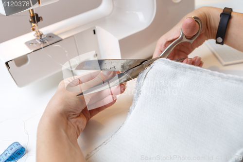 Image of Girl background of sewing machine
