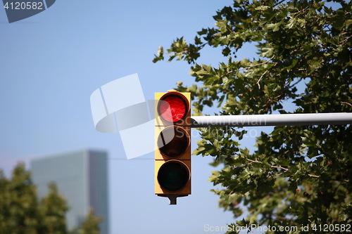 Image of red traffic light intersection