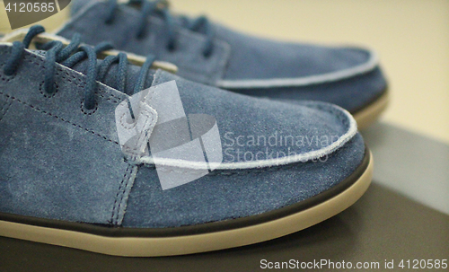 Image of  blue suede shoes for men close to