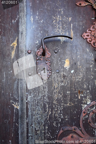 Image of Lock and door handle on of the old the front door