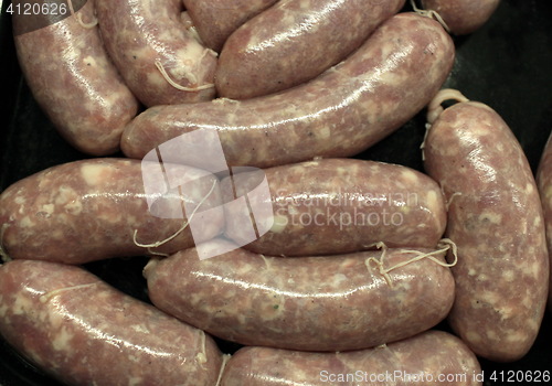 Image of fried sausages in a pan