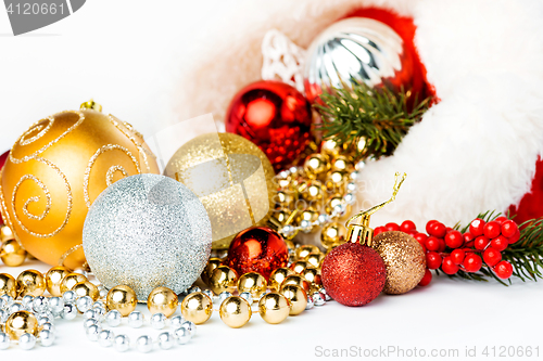 Image of Gold Christmas balls on white