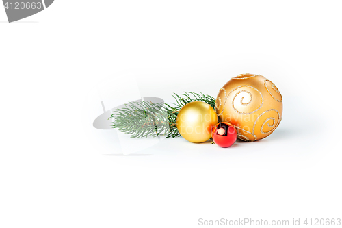Image of Gold Christmas balls on white