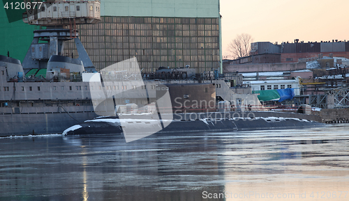 Image of  submarine to the pier