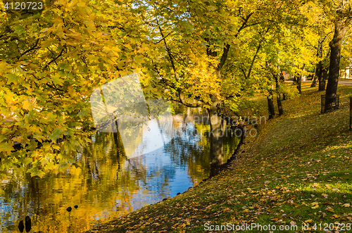 Image of Autumn park at the channel in Riga