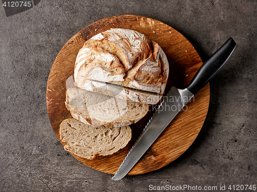 Image of freshly baked bread and knife