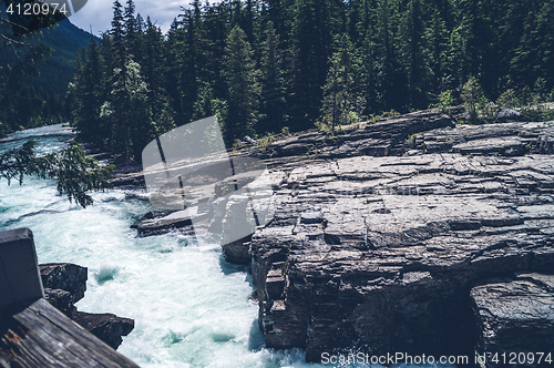 Image of River running in rocky scenery