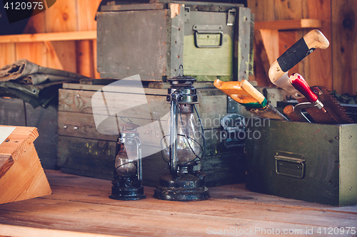 Image of Old lanterns in a wooden barn