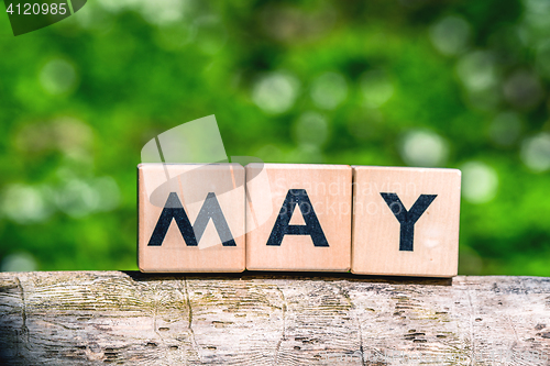 Image of May sign made of wood