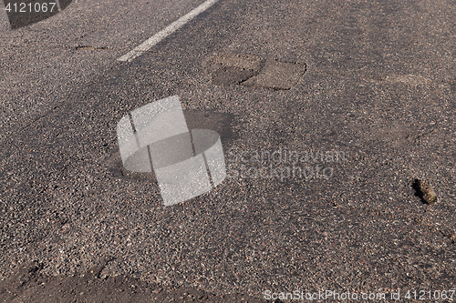 Image of broken part of the road