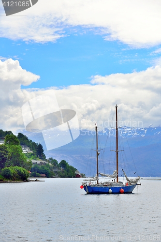 Image of Blue sailboat in Nordheimsund