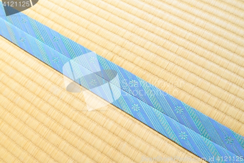 Image of Tatami with light blue edging, ribbon