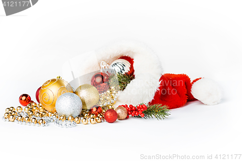 Image of Gold Christmas balls on white