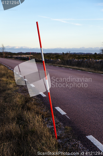 Image of Snow stake by a roadside