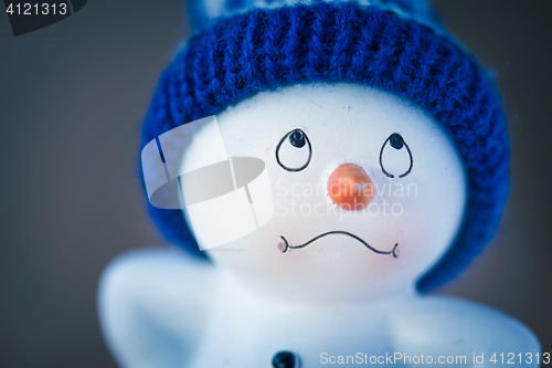 Image of Cute Snowman on Wooden Table