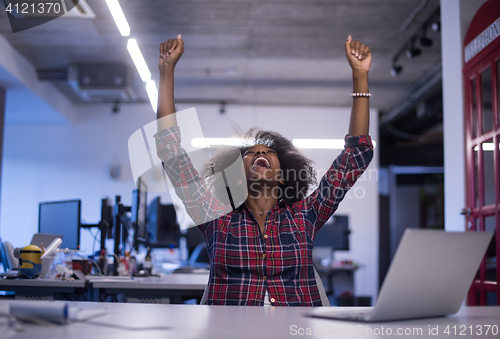 Image of portrait of a young successful African-American woman in modern 