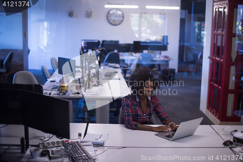 Image of portrait of a young successful African-American woman in modern 