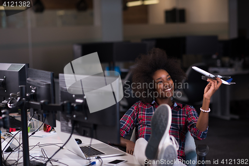 Image of portrait of a young successful African-American woman in modern 