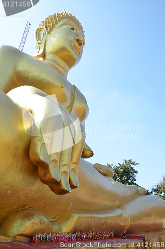 Image of Golden Buddha statue of Big Buddha over blue sky