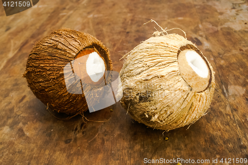 Image of Two coconuts on table