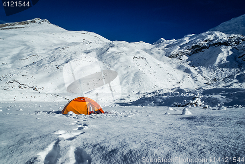 Image of Snowy country with tent