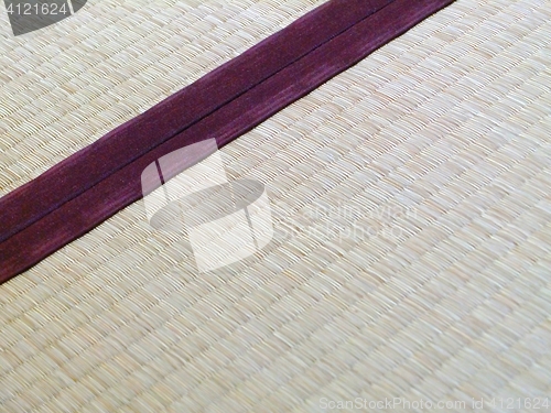 Image of Tatami mat closeup with violet edging (heri). 