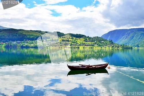 Image of Beautiful fjord with a rowboat