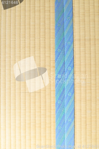 Image of Tatami with light blue edging, ribbon