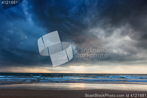 Image of Gathering storm on beach