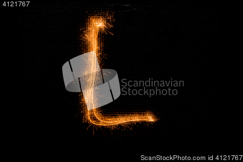Image of Letter L made of sparklers on black