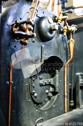 Image of Steam locomotive boiler closeup, old