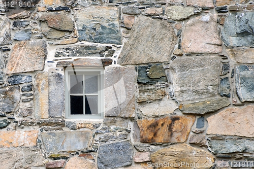Image of Old stone wall and small window