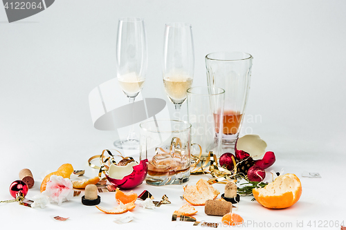 Image of The morning after christmas day, table with alcohol and leftovers