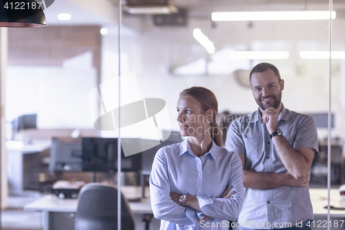 Image of business couple at office