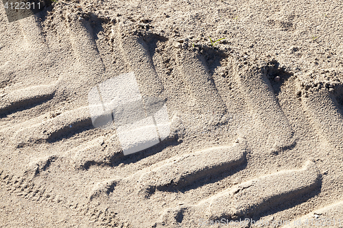 Image of footprints in the sand truck