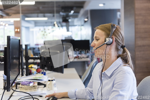 Image of female support phone operator