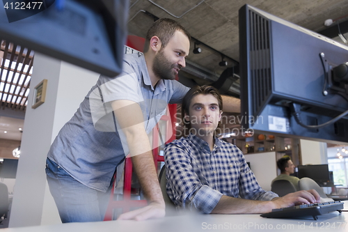 Image of startup business people group working as team to find solution