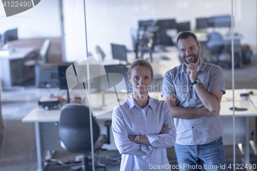 Image of business couple at office