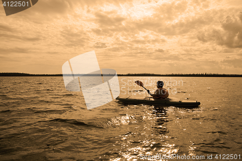 Image of Rowing at sunset