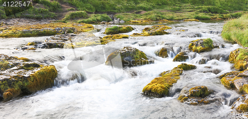 Image of Kirkjufellsfoss waterfall near the Kirkjufell mountain